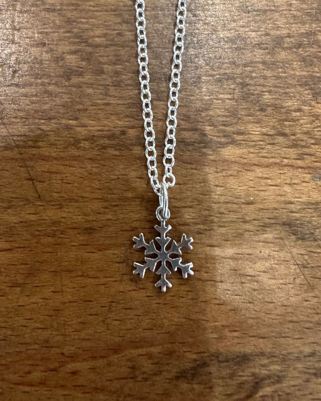 Silver 10mm Snowflake Pendant Designed and Made by Ariana Watling Lacock Wiltshire