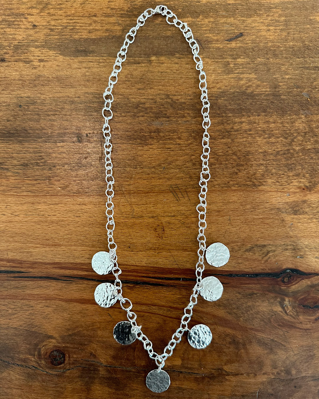 Sterling Silver 18’’ Fine ‘Unity’ Necklace with 7 Hanging ‘Dippin Dot’ Discs Designed and Made by Ariana Watling Lacock Wiltshire